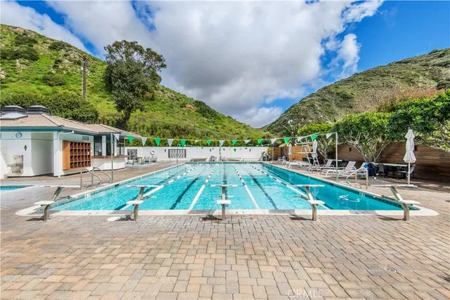 a view of a patio with a fountain