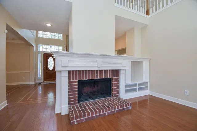 a large kitchen with a sink and cabinets