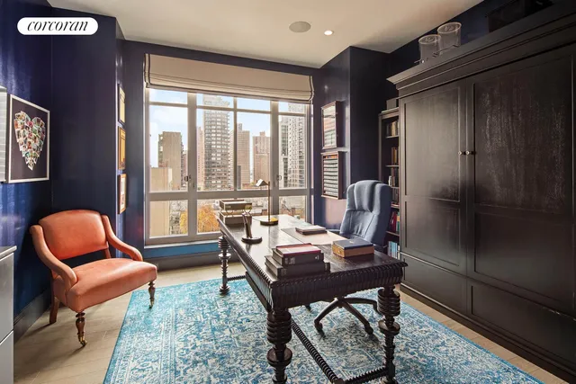 a bed room with a bed and a window