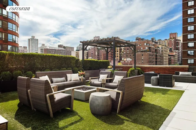 a view of a tall building and outdoor space