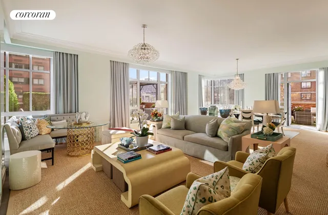a view of a balcony with chairs and a potted plant
