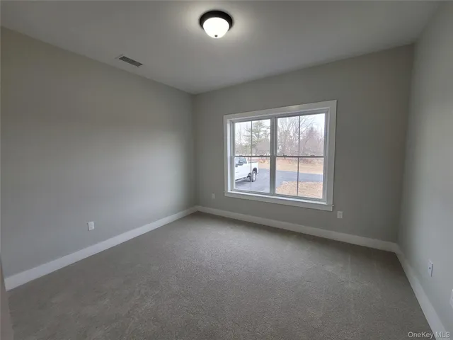 a bathroom with a double vanity sink toilet and shower