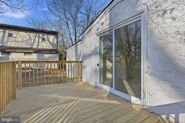 a balcony with wooden floor