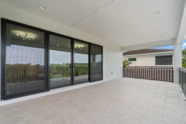 a view of a lake with houses in the back