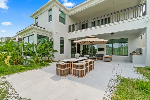a kitchen with a stove and a white cabinets