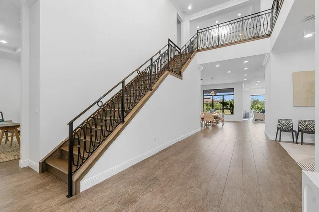 a view of a livingroom with furniture window and wooden floor