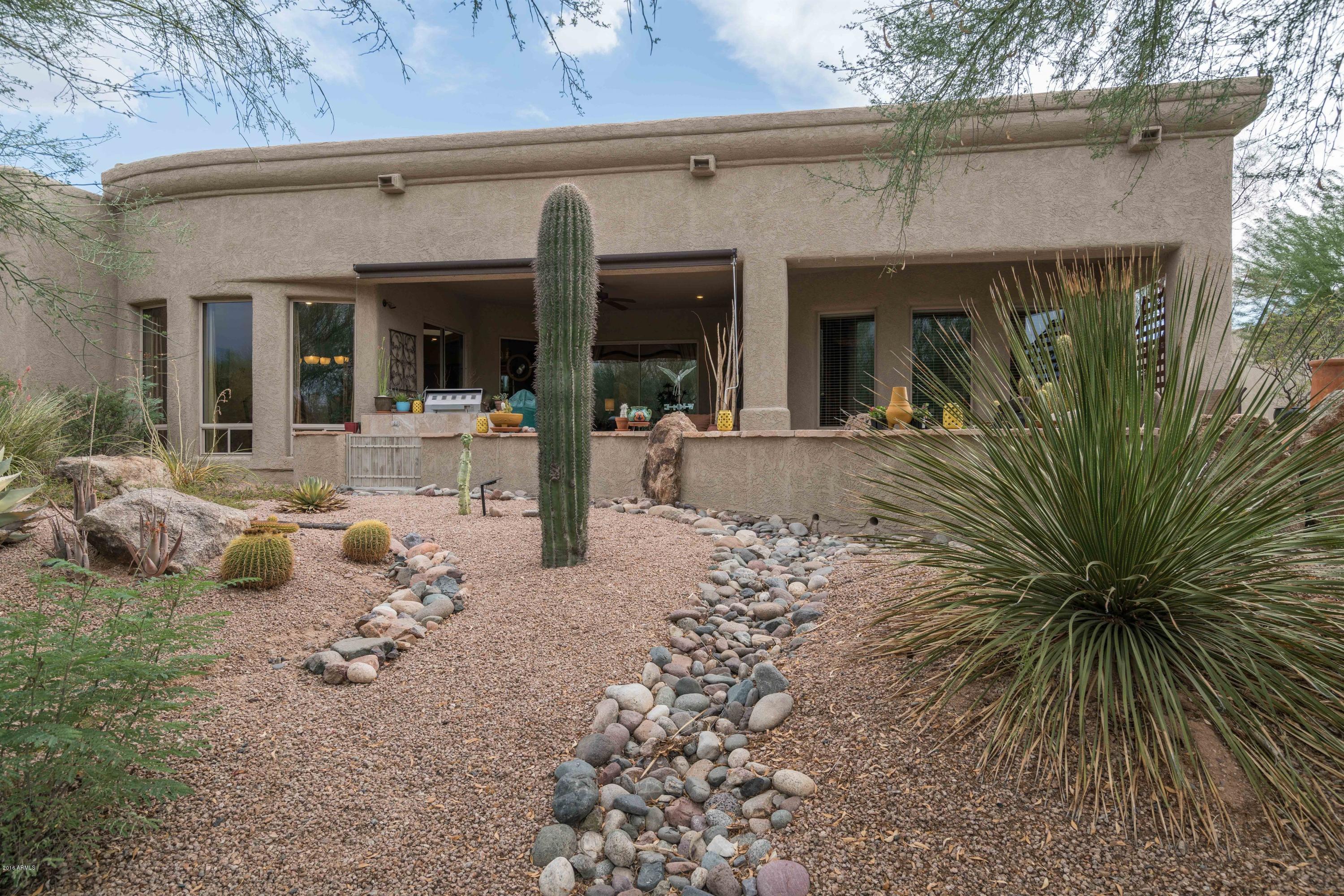 27913 North Quail Spring Road Rio Verde, AZ 85263 - Photo 21 of 63 a view of a house with a patio