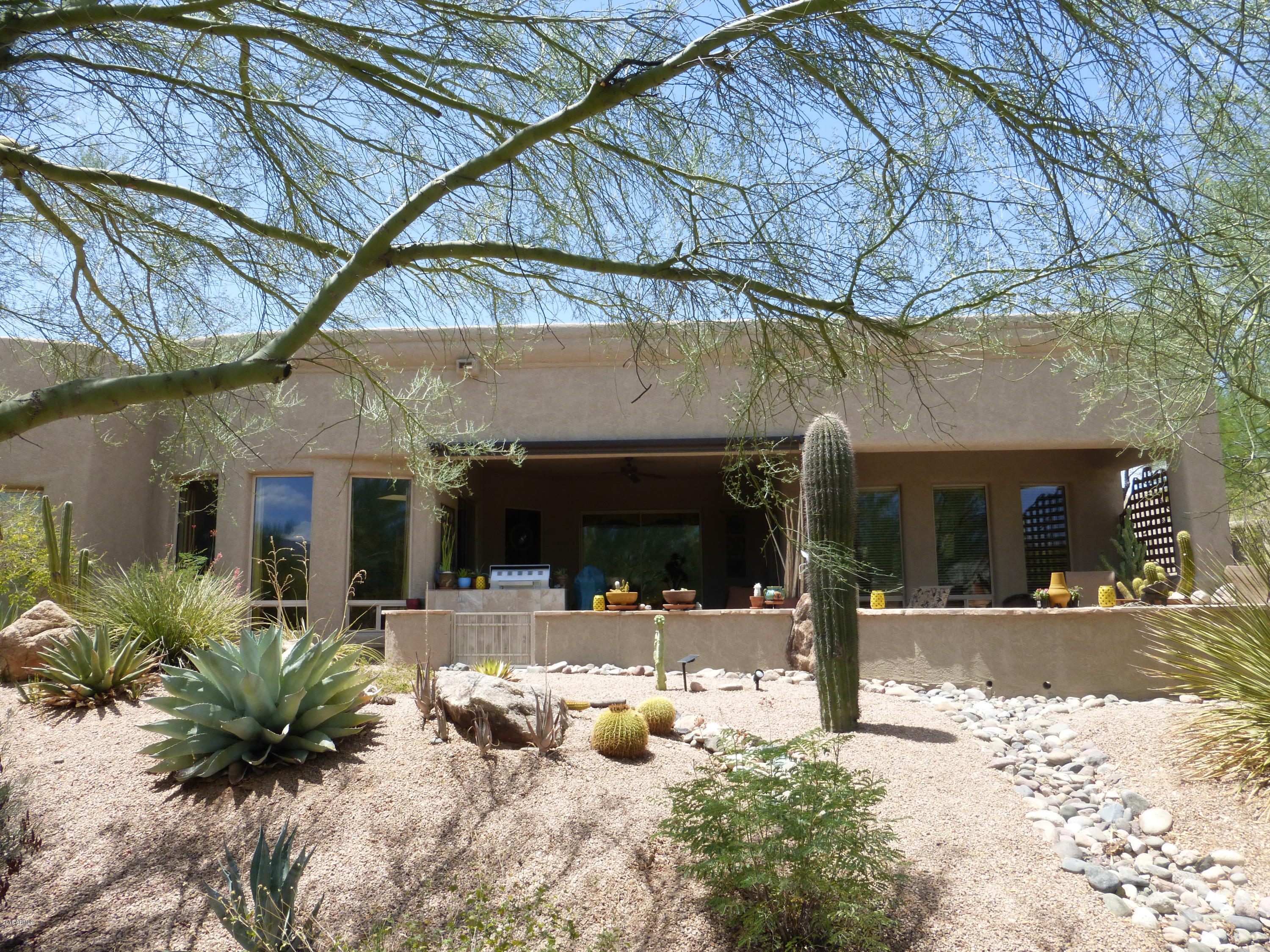27913 North Quail Spring Road Rio Verde, AZ 85263 - Photo 33 of 63 a view of a building with an outdoor space