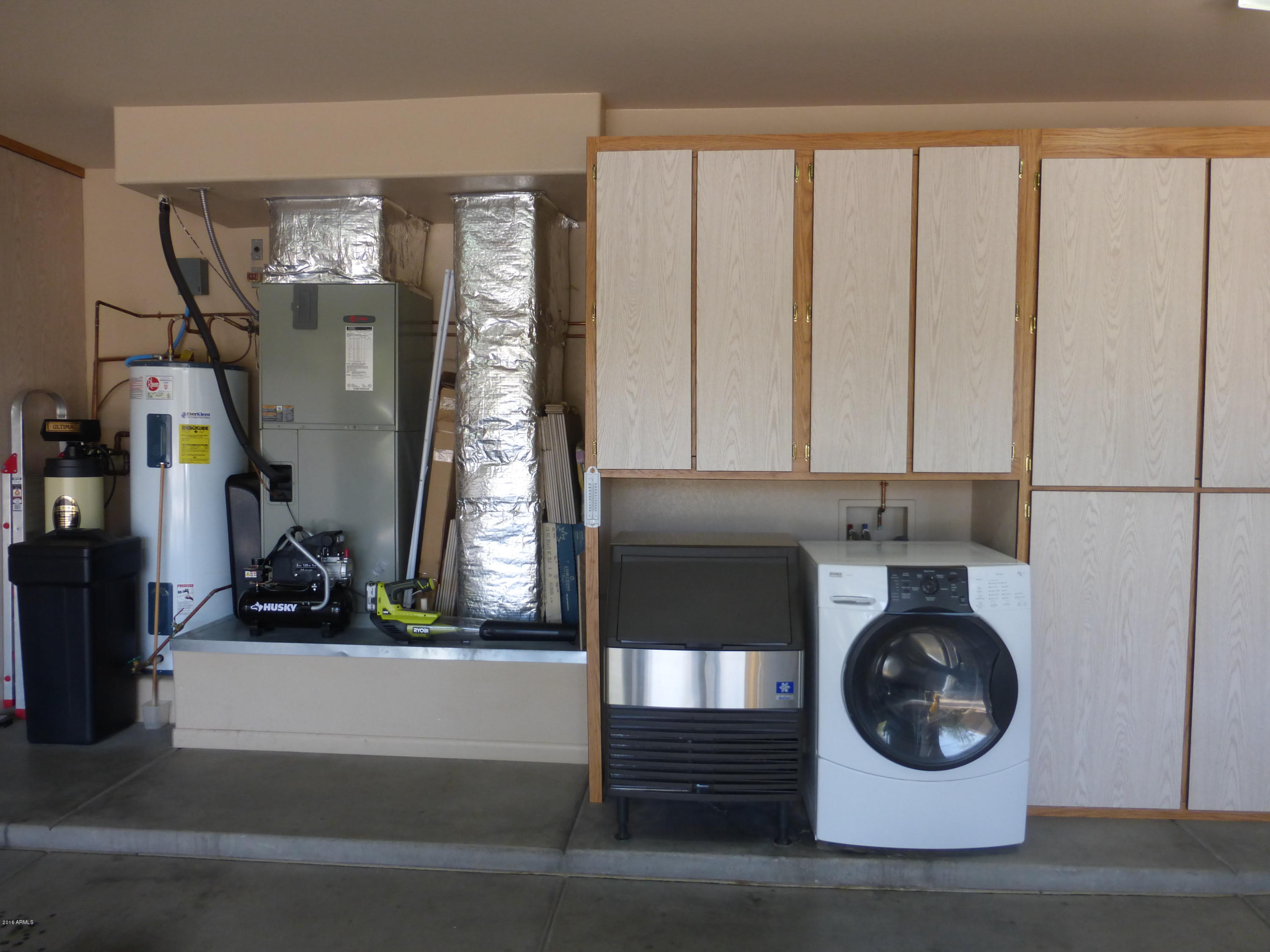 27913 North Quail Spring Road Rio Verde, AZ 85263 - Photo 40 of 63 a utility room with dryer and washer