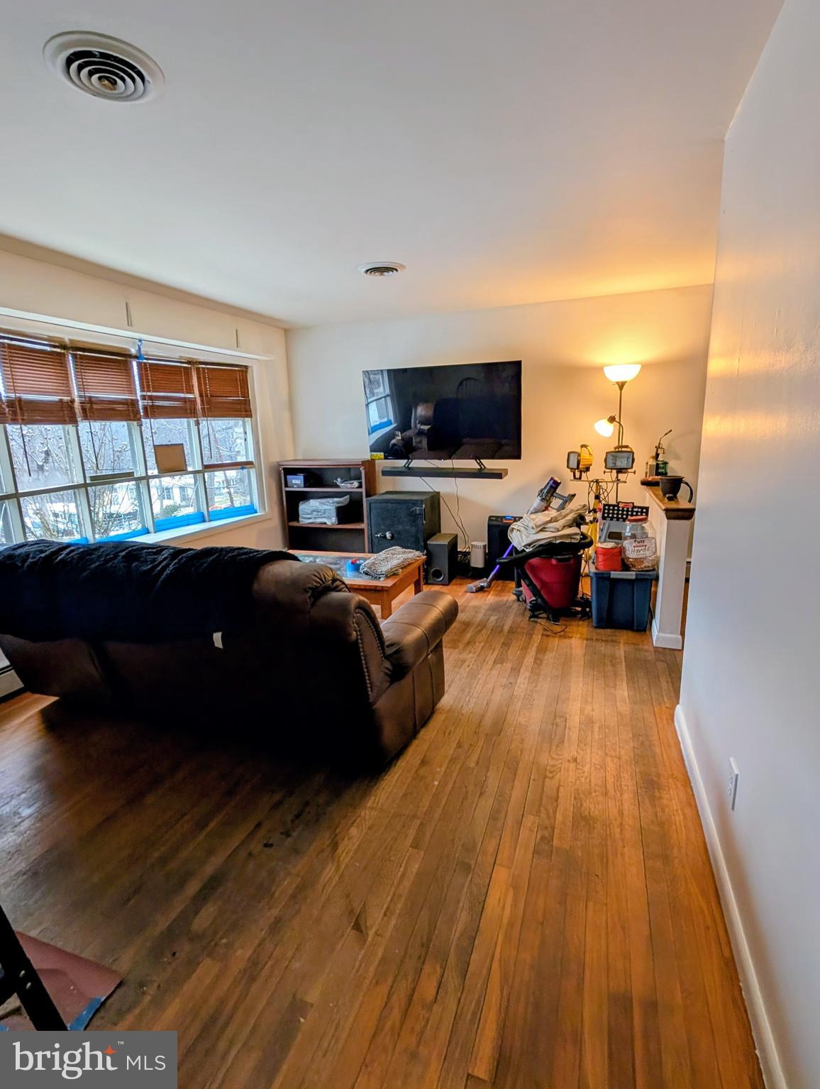 306 Gum Tree Road Coatesville, PA 19320 - Photo 2 of 15 a living room with furniture and a flat screen tv