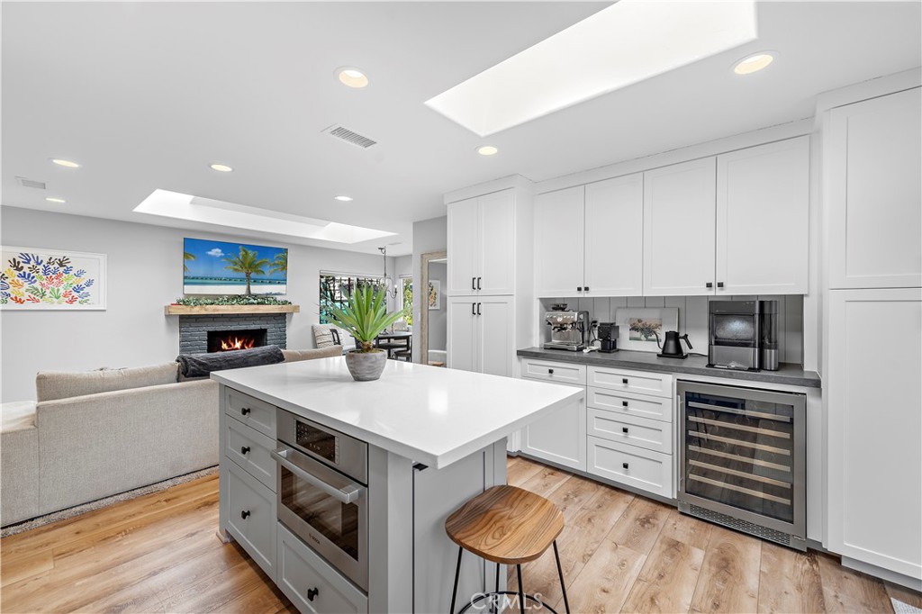 130 West Mariposa San Clemente, CA 92672 - Photo 12 of 42 a kitchen with a stove a sink and a refrigerator