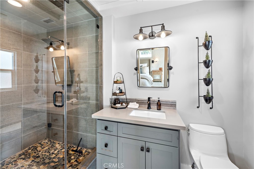 130 West Mariposa San Clemente, CA 92672 - Photo 20 of 42 a bathroom with a sink toilet and shower