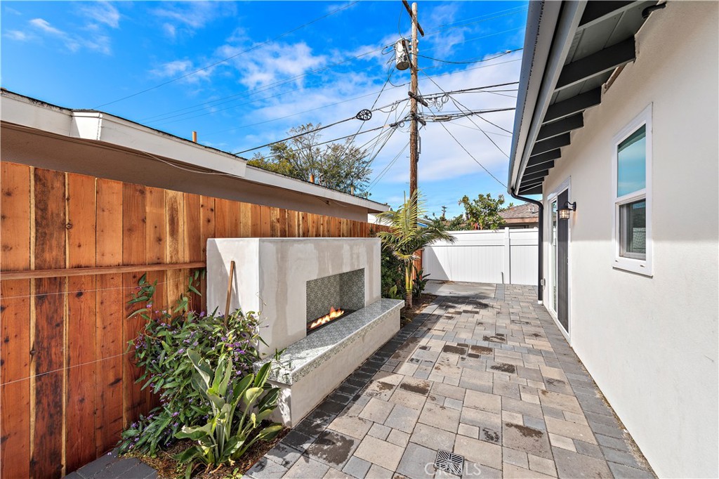 130 West Mariposa San Clemente, CA 92672 - Photo 29 of 42 a view of a backyard with pathway