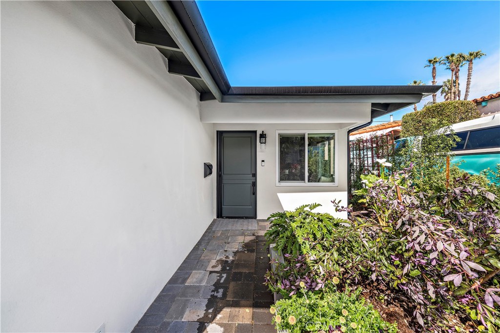 130 West Mariposa San Clemente, CA 92672 - Photo 3 of 42 a front view of a house with a yard