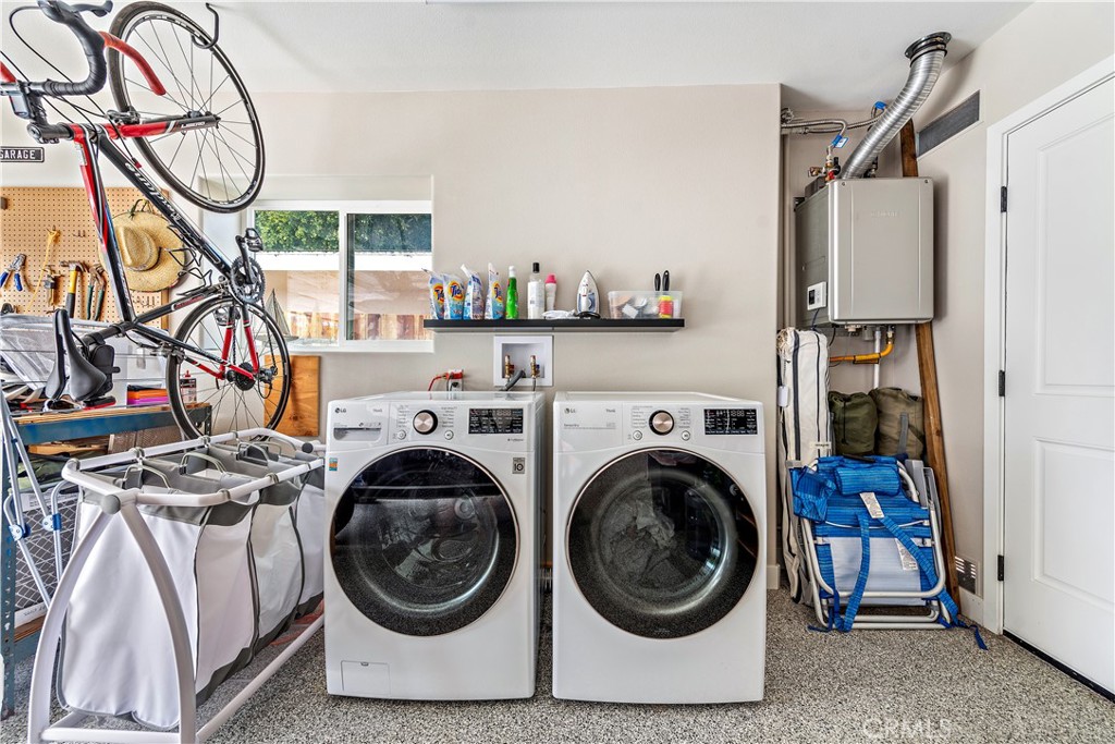 130 West Mariposa San Clemente, CA 92672 - Photo 31 of 42 a view of a storage & utility room with washer and dryer