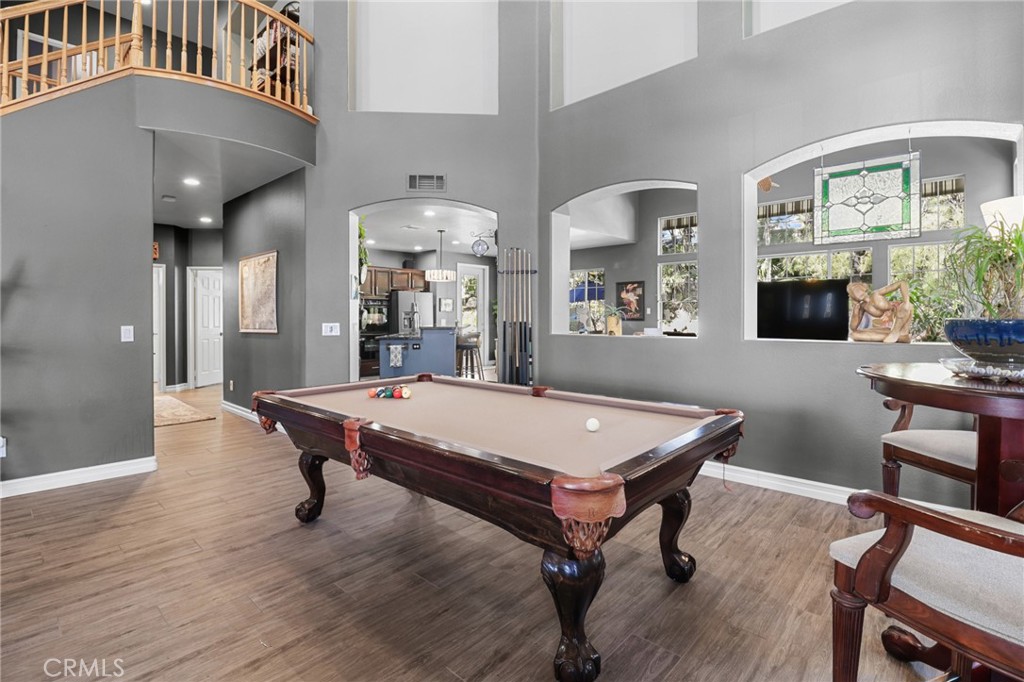 12786 North Rim Way Rancho Cucamonga, CA 91739 - Photo 9 of 50 a room with pool table and windows