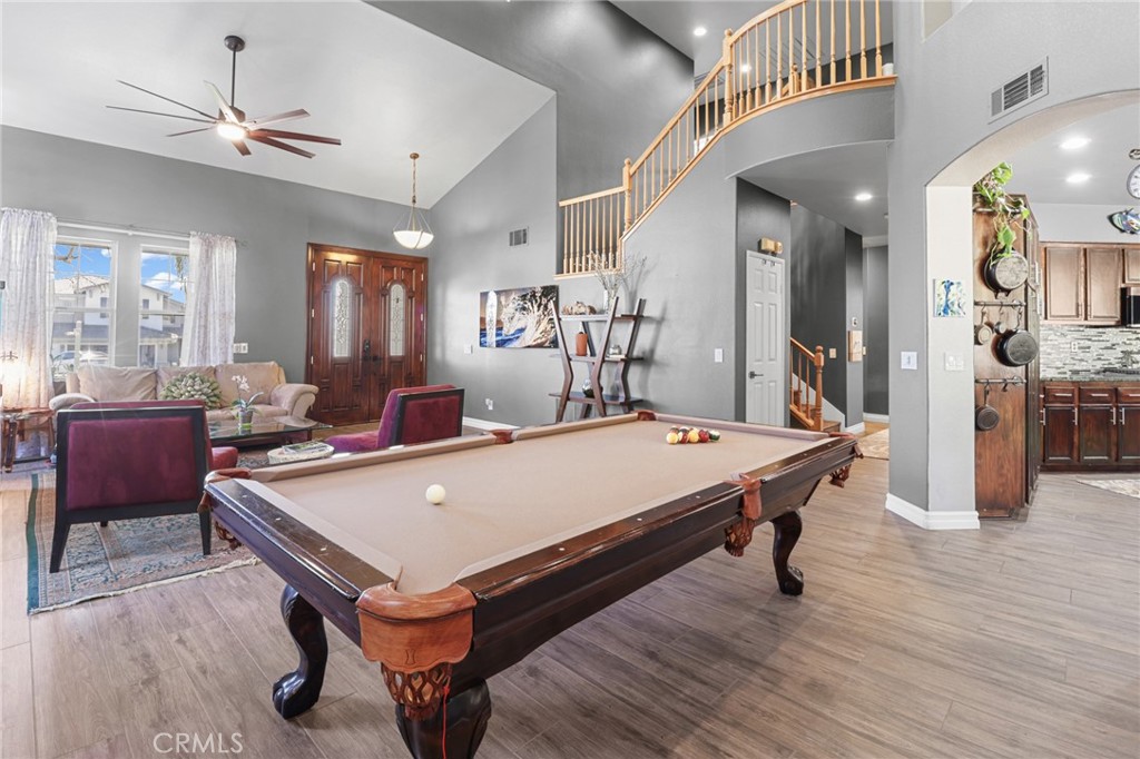 12786 North Rim Way Rancho Cucamonga, CA 91739 - Photo 10 of 50 a living room with a table chairs and a table