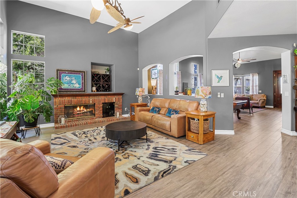 12786 North Rim Way Rancho Cucamonga, CA 91739 - Photo 11 of 50 a living room with furniture and a fireplace