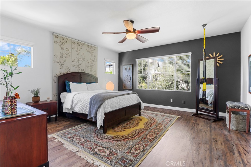 12786 North Rim Way Rancho Cucamonga, CA 91739 - Photo 26 of 50 a bed room with a bed window and a chandelier