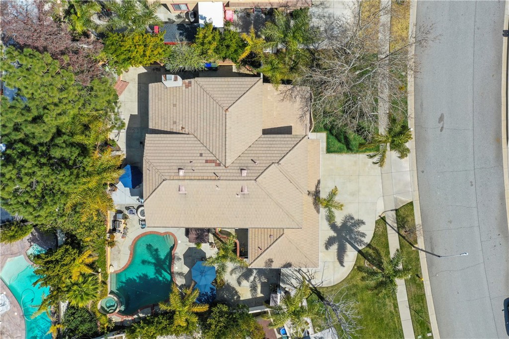 12786 North Rim Way Rancho Cucamonga, CA 91739 - Photo 3 of 50 an aerial view of a house with a yard and covered with trees