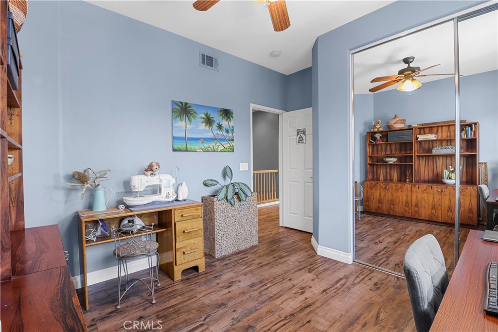 12786 North Rim Way Rancho Cucamonga, CA 91739 - Photo 33 of 50 a living room with furniture and wooden floor