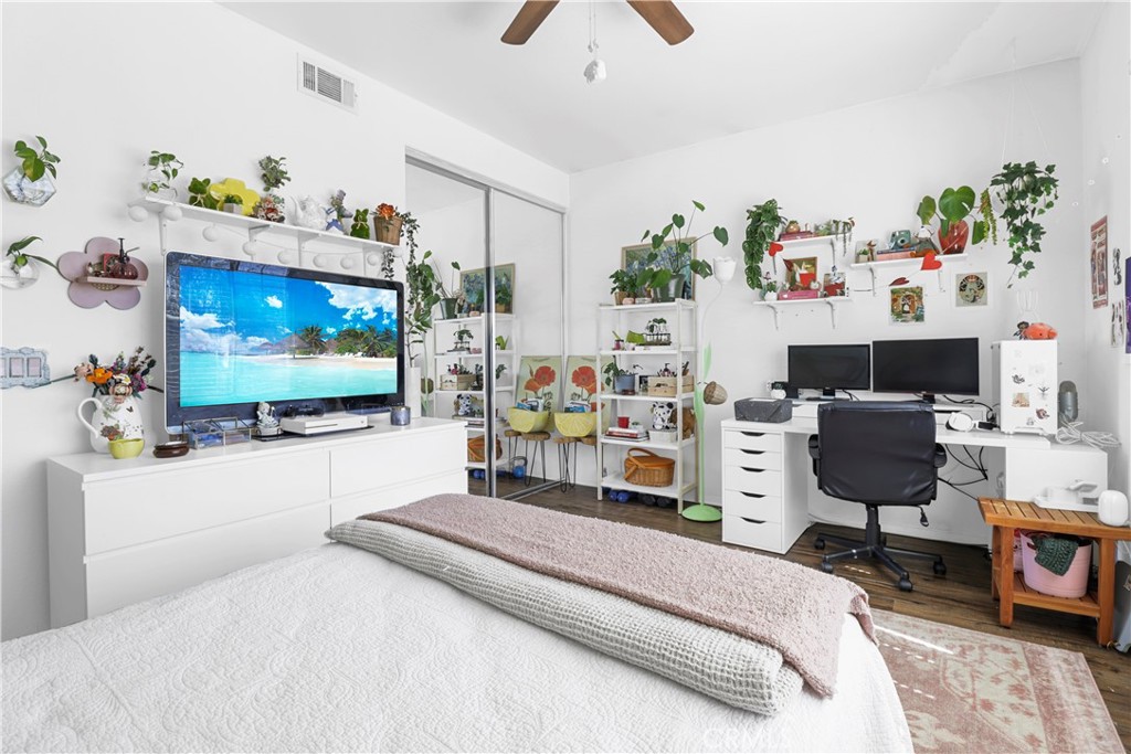12786 North Rim Way Rancho Cucamonga, CA 91739 - Photo 38 of 50 a bedroom with a bed and a flat screen tv