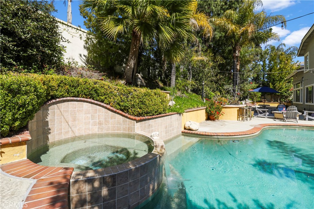 12786 North Rim Way Rancho Cucamonga, CA 91739 - Photo 43 of 50 a view of a swimming pool with a garden