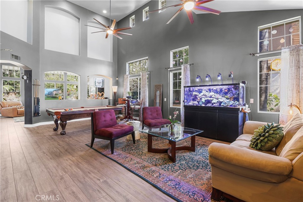 12786 North Rim Way Rancho Cucamonga, CA 91739 - Photo 7 of 50 a living room with furniture a rug and a flat screen tv