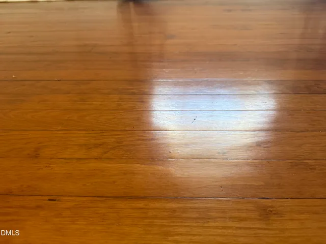 a view of a livingroom with wooden floor