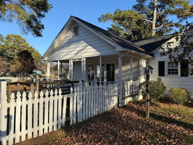a front view of a house with a porch
