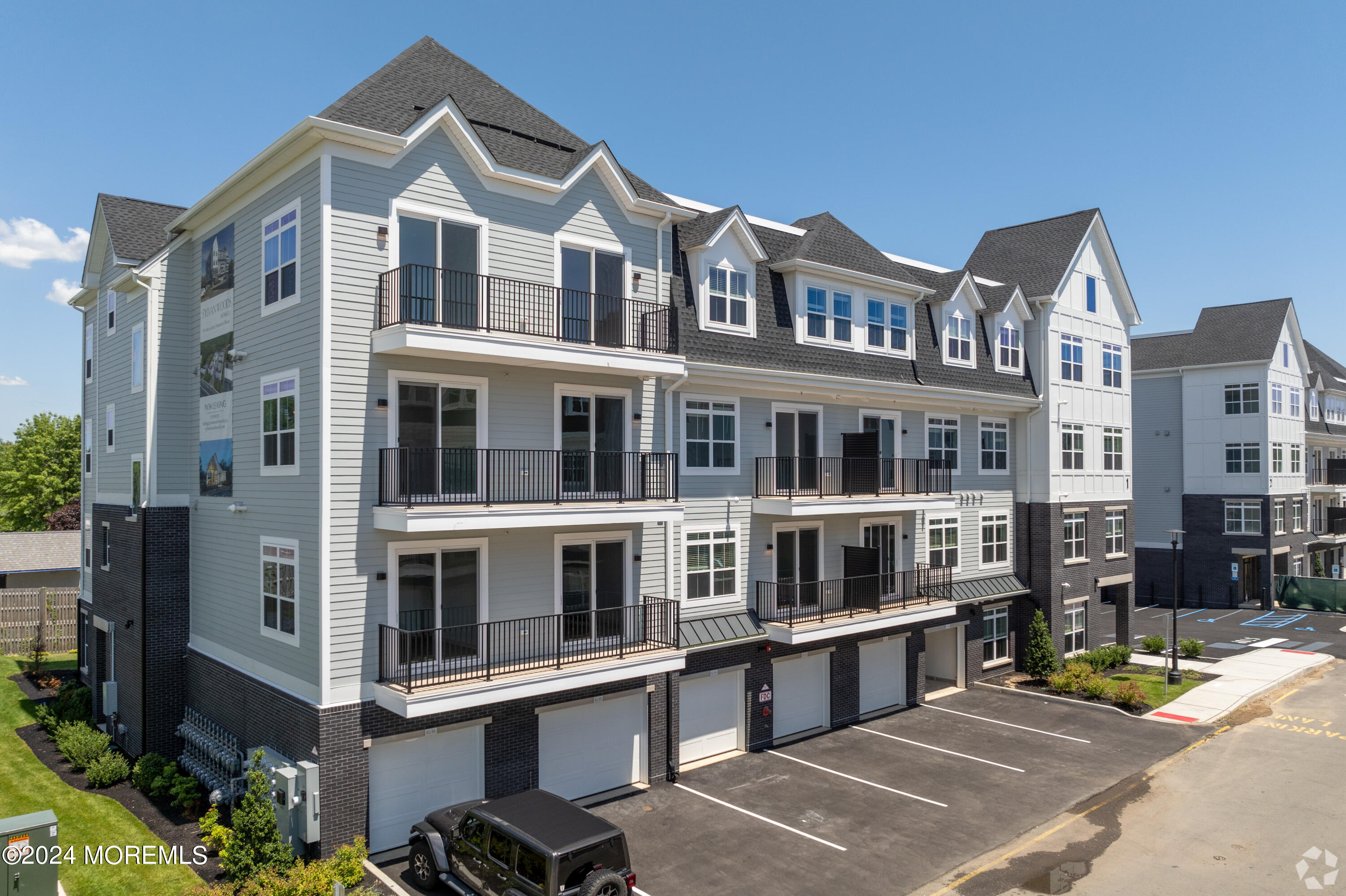 6461 Highway 9, Unit #134 Howell, NJ 07731 - Photo 1 of 21 a large building with a lot of windows