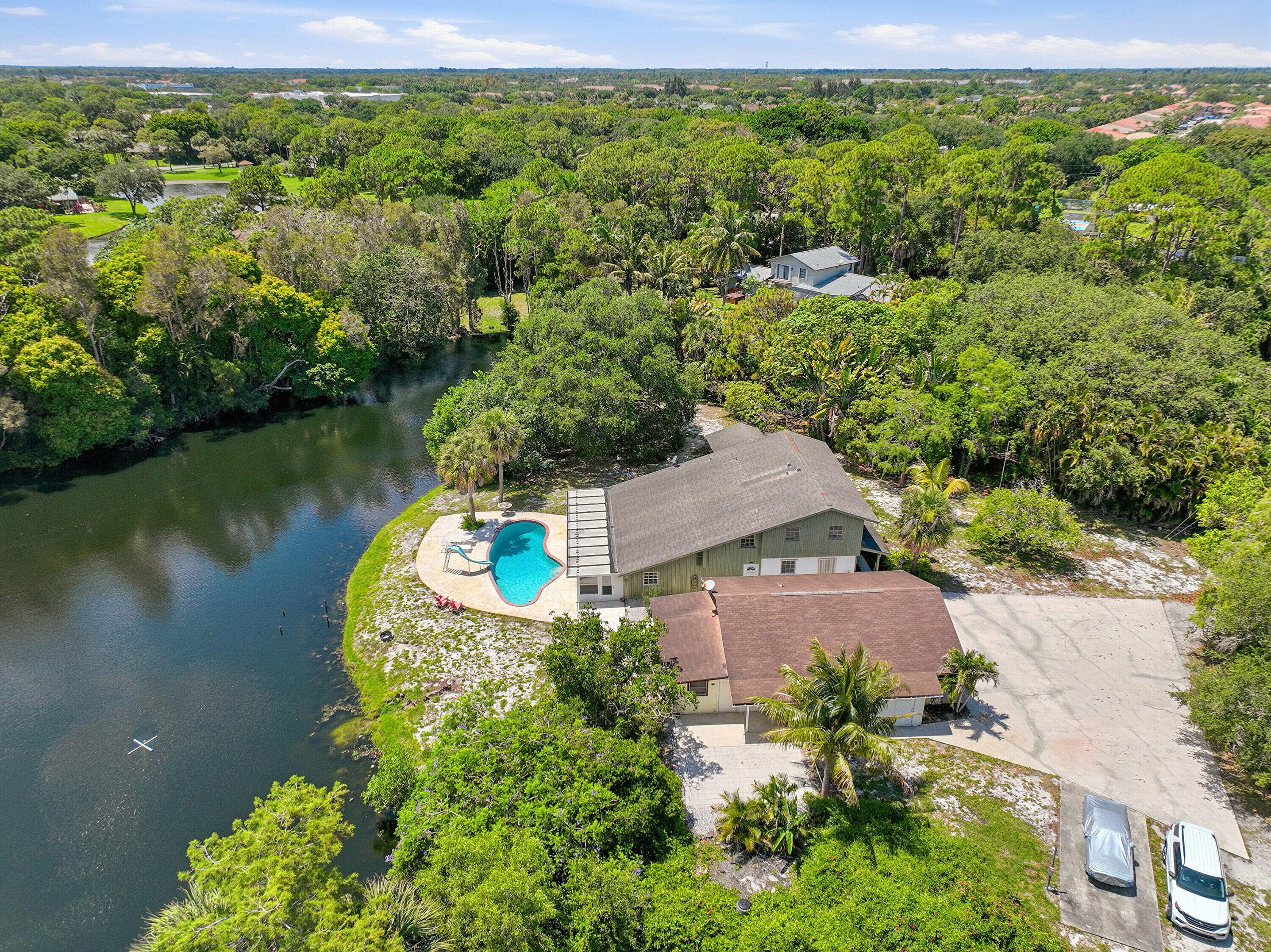 7689 Lawrence Road Boynton Beach, FL 33436 - Photo 1 of 40 45_dji_0560_1_2_3_4