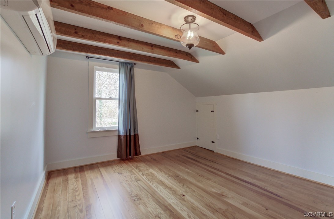 2567 Broad St Road Gum Spring, VA 23065 - Photo 21 of 38 an empty room with wooden floor fan and windows