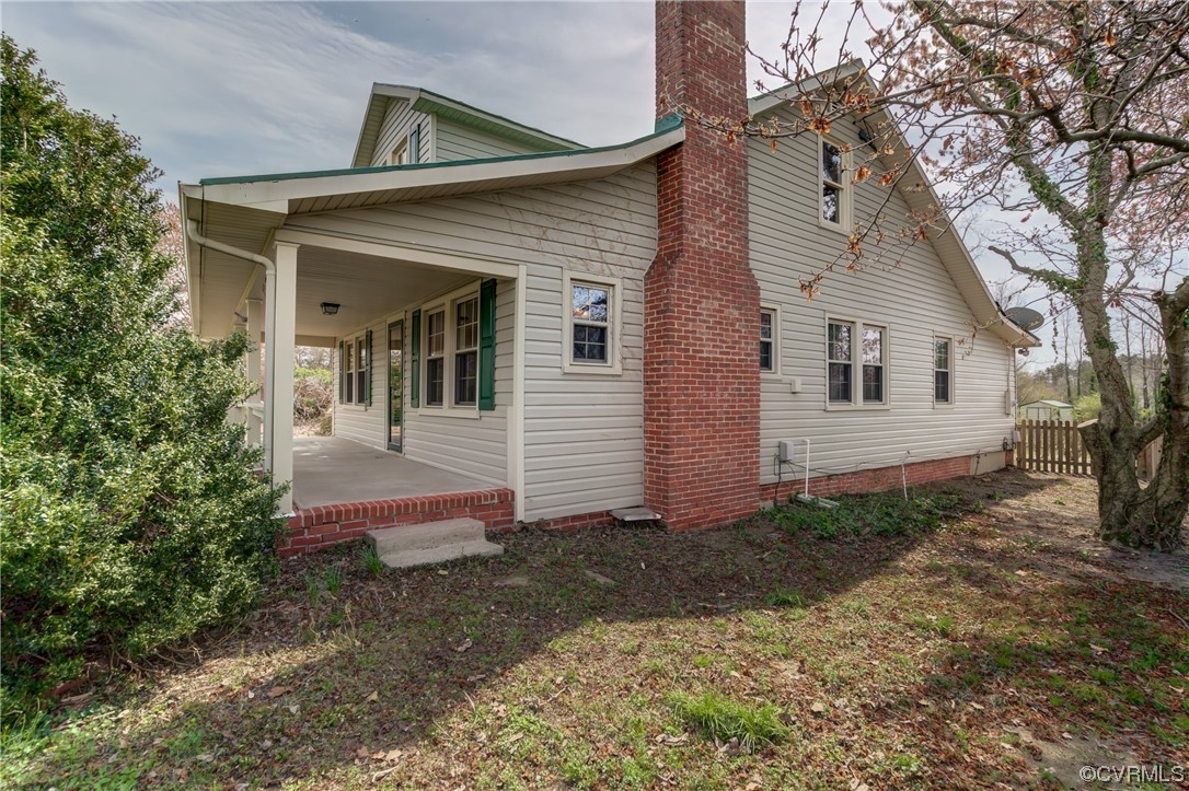 2567 Broad St Road Gum Spring, VA 23065 - Photo 30 of 38 a front view of a house with garden