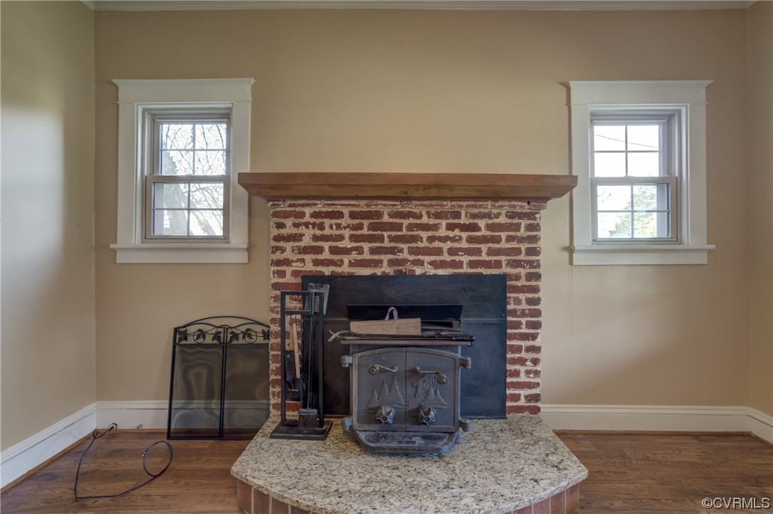 2567 Broad St Road Gum Spring, VA 23065 - Photo 5 of 38 a living room with furniture and a fireplace