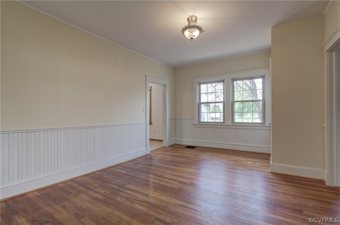 2567 Broad St Road Gum Spring, VA 23065 - Photo 6 of 38 an empty room with wooden floor and windows