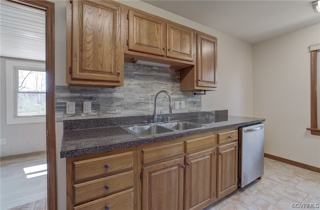 2567 Broad St Road Gum Spring, VA 23065 - Photo 10 of 38 a kitchen with stainless steel appliances granite countertop a sink and cabinets