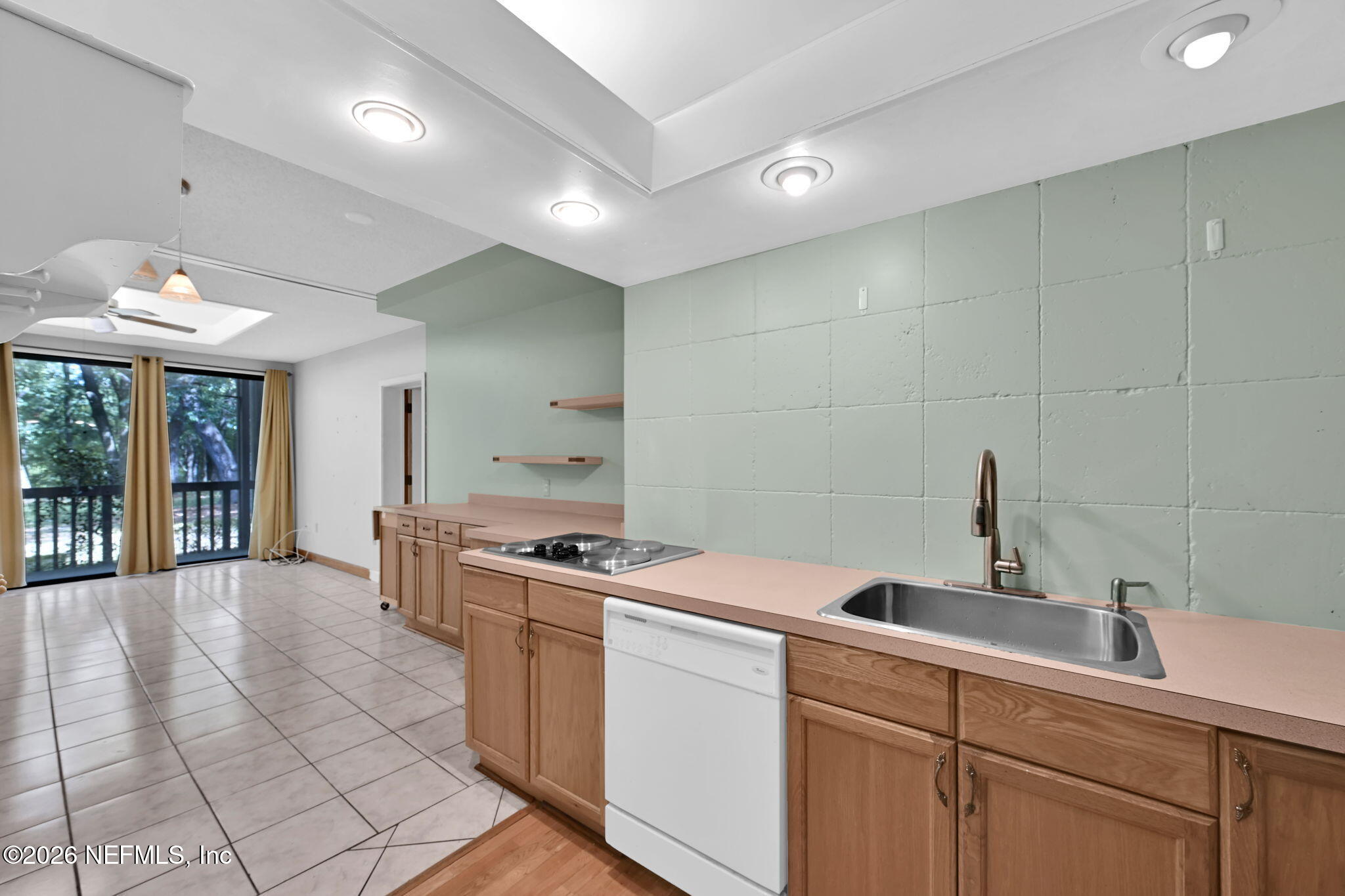 2910 Ravines Road, Unit 1108 Middleburg, FL 32068 - Photo 11 of 34 Kitchen to Living and Patio