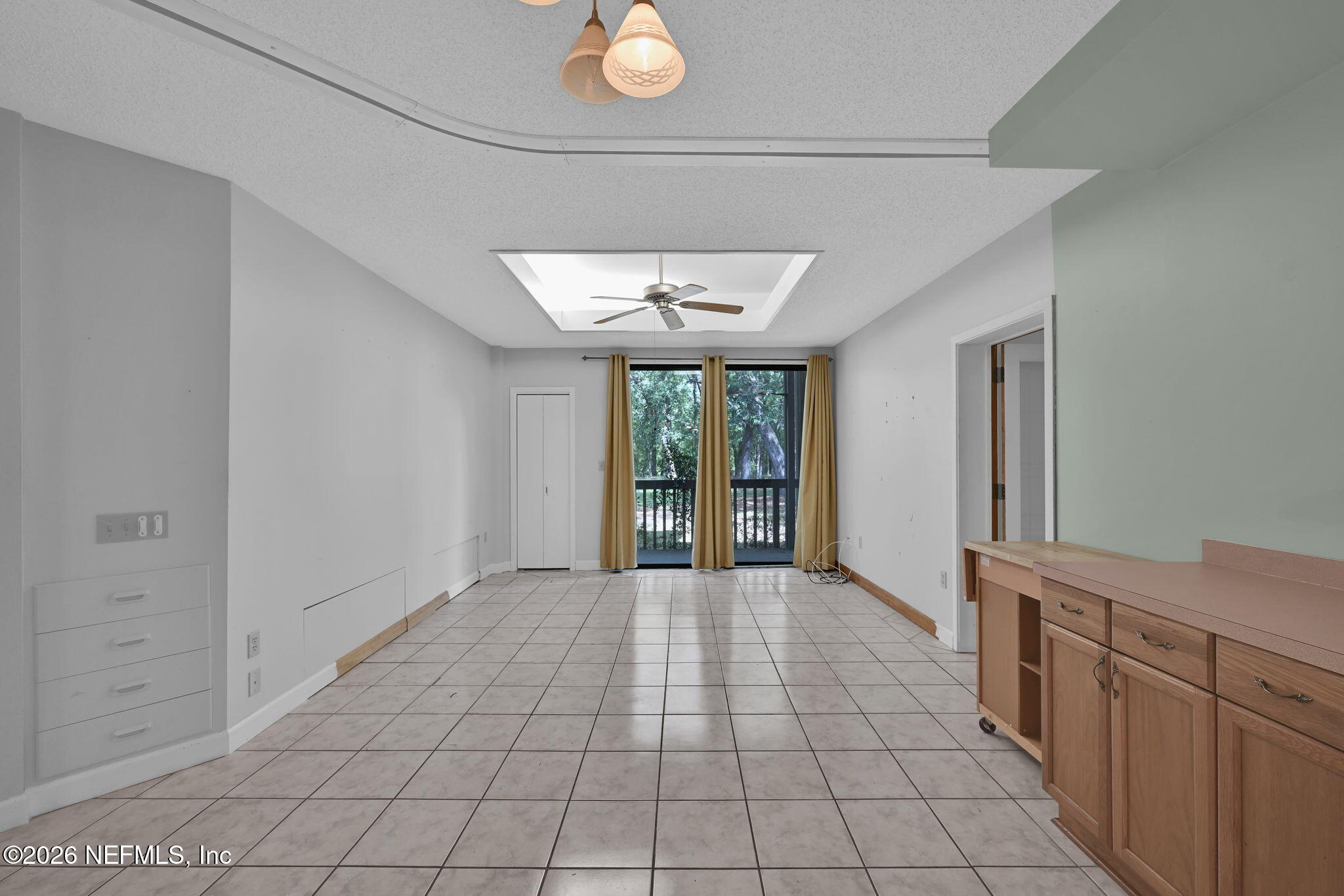 2910 Ravines Road, Unit 1108 Middleburg, FL 32068 - Photo 13 of 34 Kitchen to Living and Bed 2 Entry