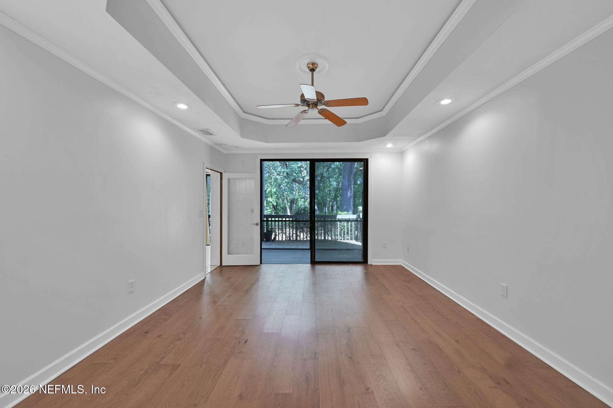 2910 Ravines Road, Unit 1108 Middleburg, FL 32068 - Photo 25 of 34 Bed 2 Living out to Screened Patio