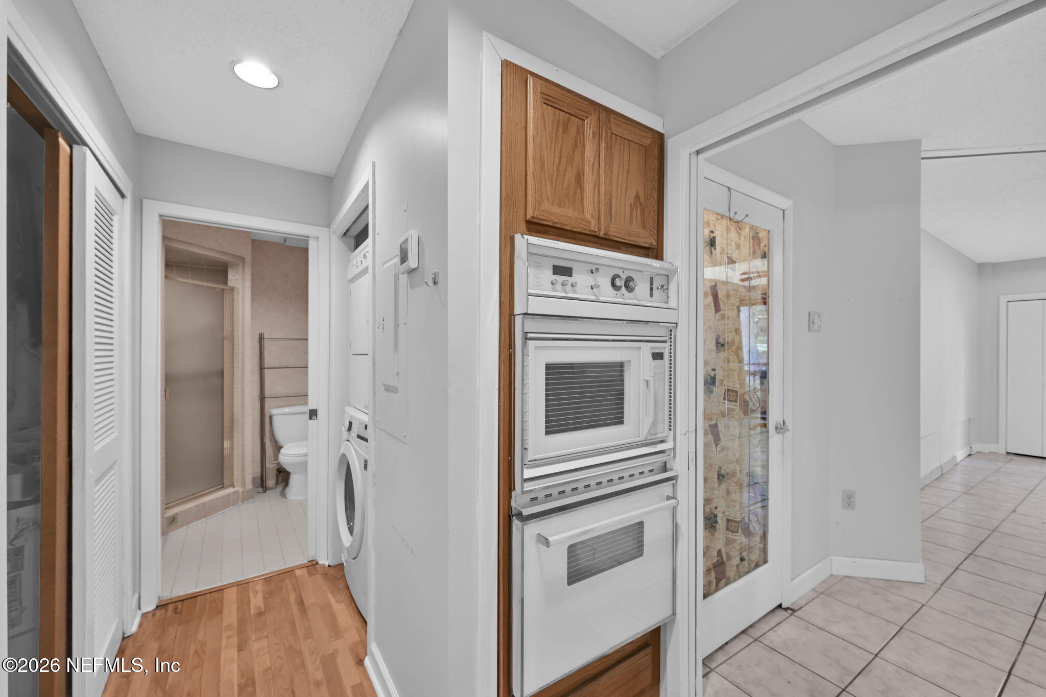 2910 Ravines Road, Unit 1108 Middleburg, FL 32068 - Photo 5 of 34 Micro/oven, Pantry & hallway to Bath