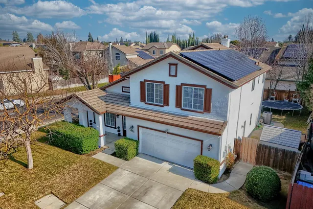 front view of a house with a street