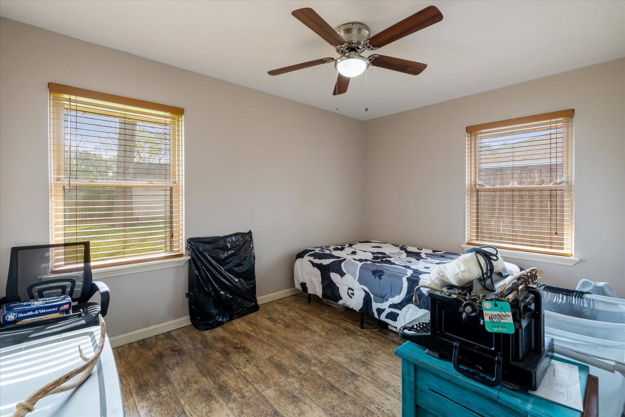 2423 Metz Street Houston, TX 77034 - Photo 16 of 22 a bedroom with furniture and a window