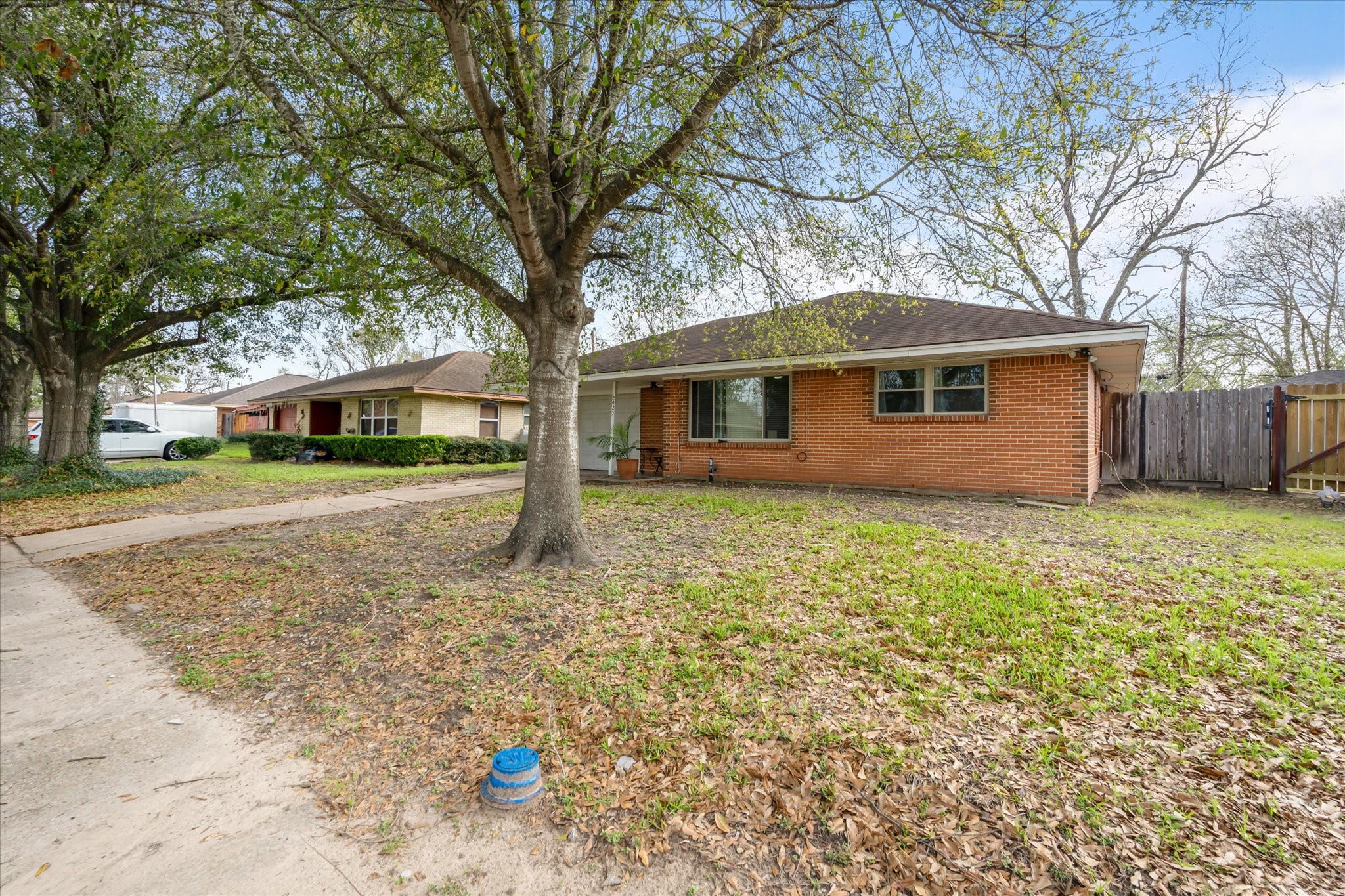 2423 Metz Street Houston, TX 77034 - Photo 18 of 22 a view of house with a yard