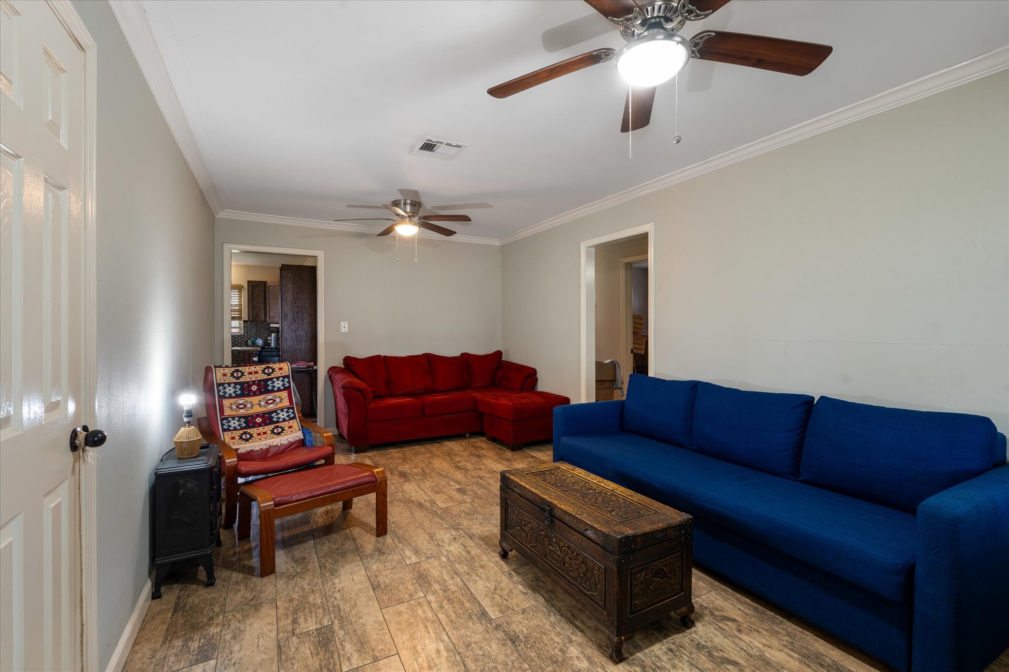 2423 Metz Street Houston, TX 77034 - Photo 3 of 22 a living room with furniture and a chandelier