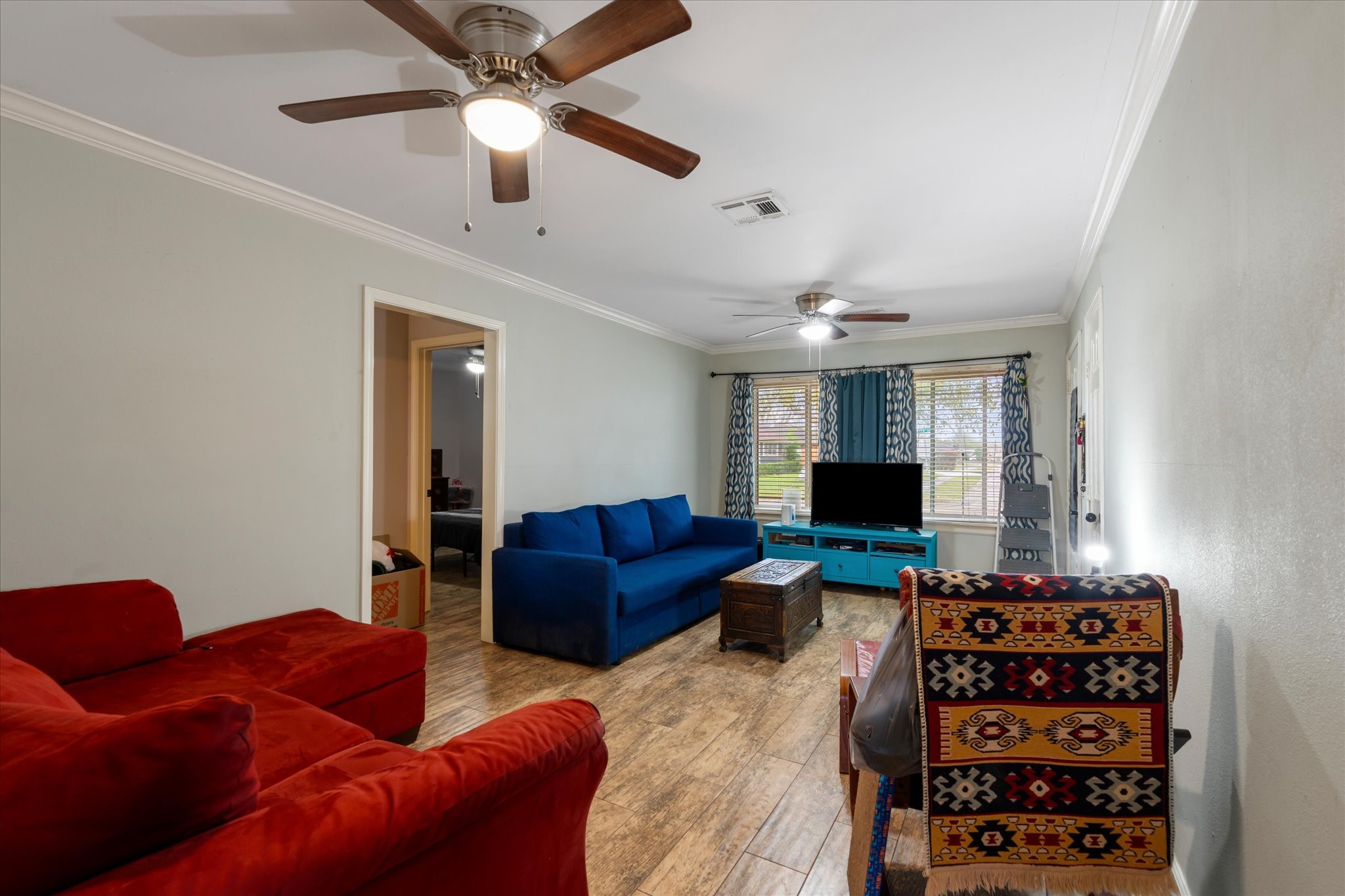 2423 Metz Street Houston, TX 77034 - Photo 4 of 22 a living room with furniture and a flat screen tv