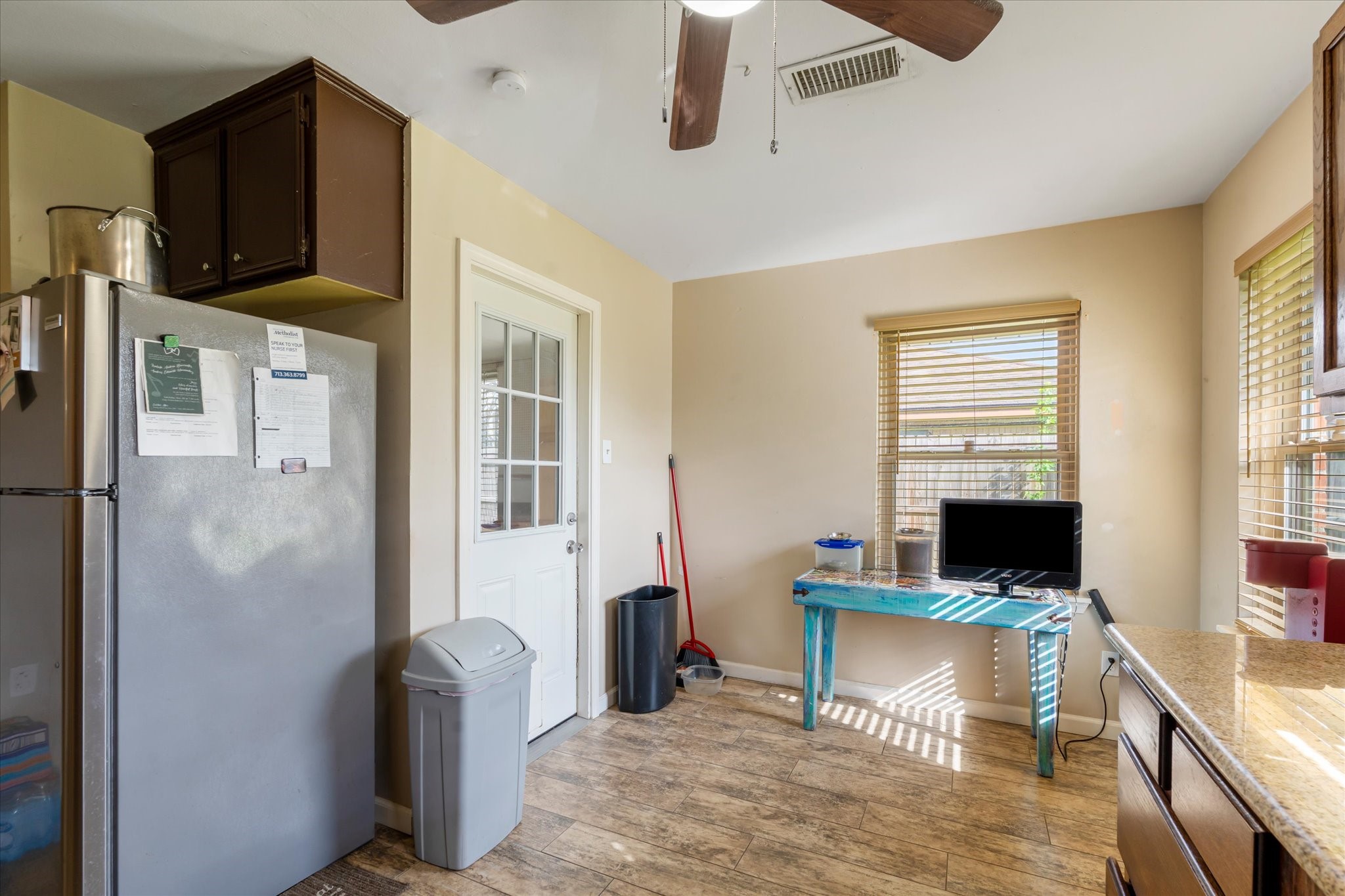 2423 Metz Street Houston, TX 77034 - Photo 7 of 22 a view of a livingroom with furniture window and wooden floor