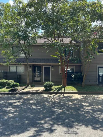 a house with yard in front of it