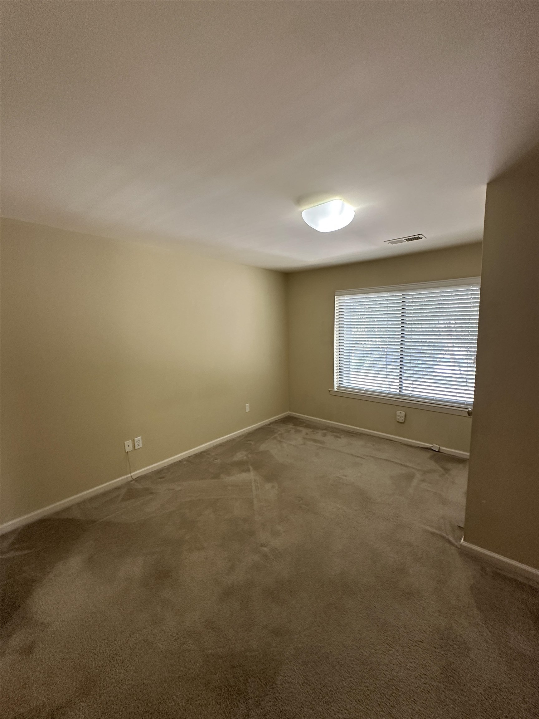 1837 Gray Ridge Cove, Unit 3 Germantown, TN 38138 - Photo 12 of 20 an empty room with a window