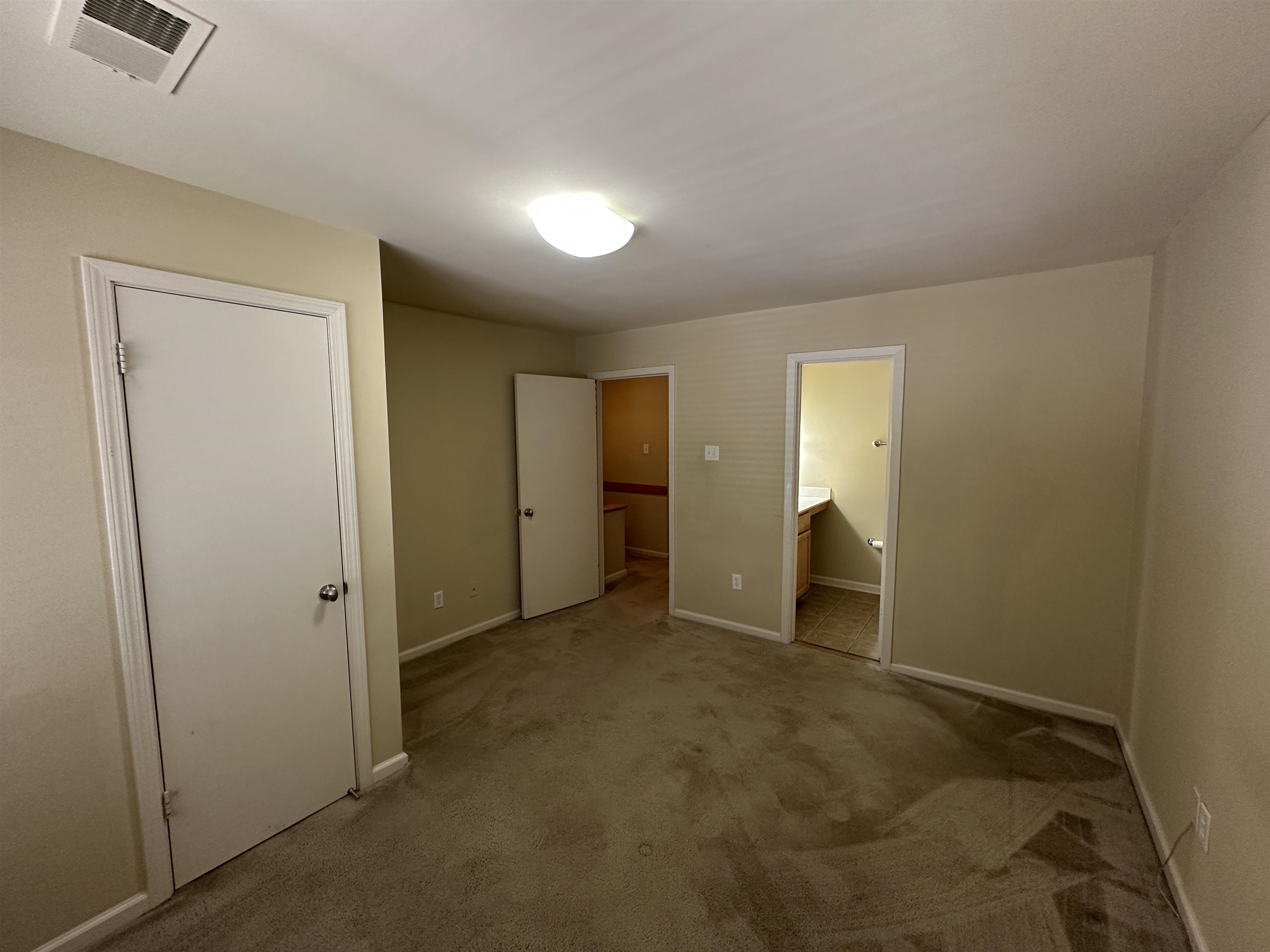 1837 Gray Ridge Cove, Unit 3 Germantown, TN 38138 - Photo 13 of 20 an empty room with closet and bathroom